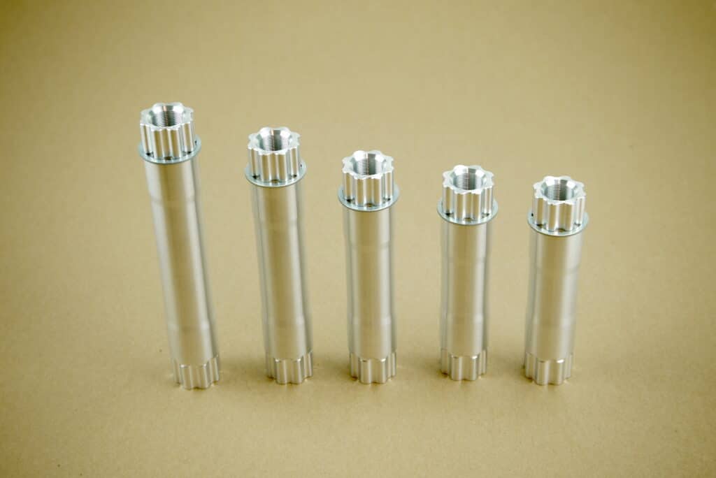 5 different length Appleman 2xr spindles from road to fat bike.