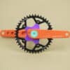 Appleman 2XR crankset in purple, orange, and turquoise